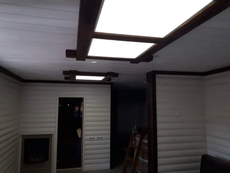 Two rooflights fitted into a ceiling in a room still being built