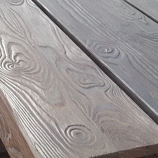 Close view of brushed timber grain on a finished board